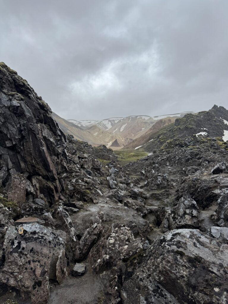 The colorful rhyolite mountains and steaming geothermal springs of Landmannalaugar in the Icelandic Highlands