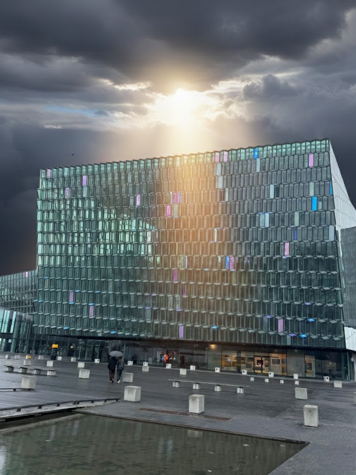 The modern Harpa Concert Hall in Reykjavik featuring its unique geometric glass facade by Olafur Eliasson