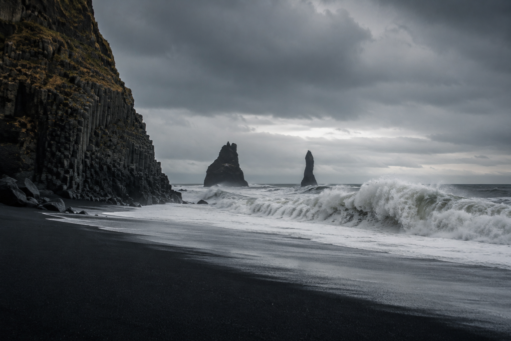 Powerful sneaker waves at Reynisfjara black sand beach Iceland safety warning